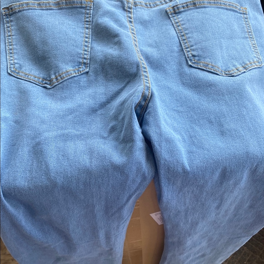 Distressed Light Blue Jeans